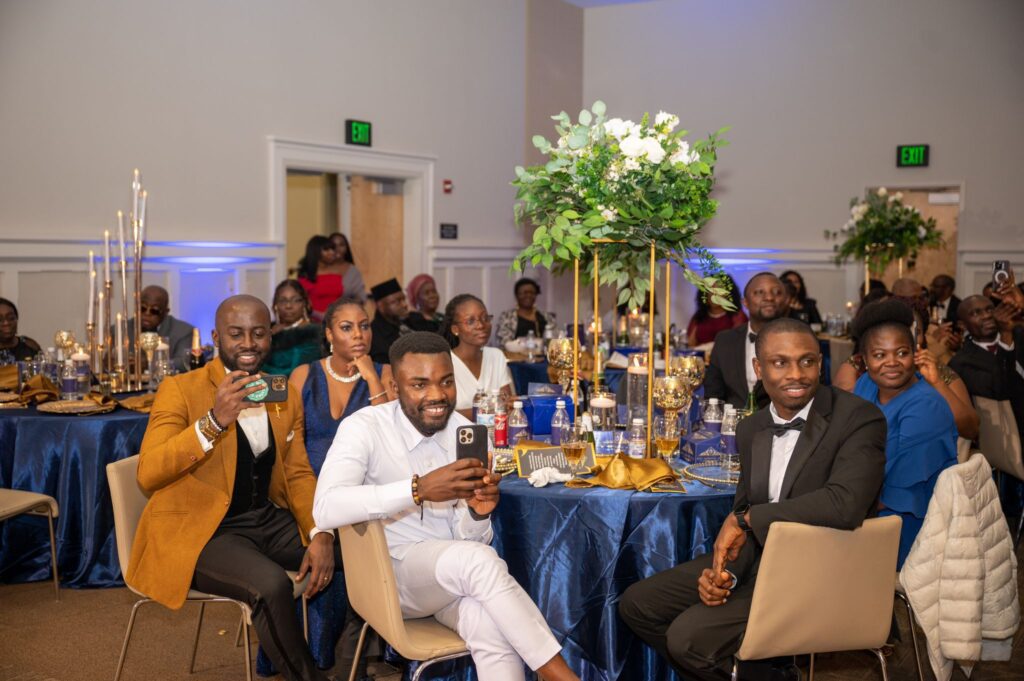 Mclevioflife MC and vibecraftstudios presenting awards at a formal event